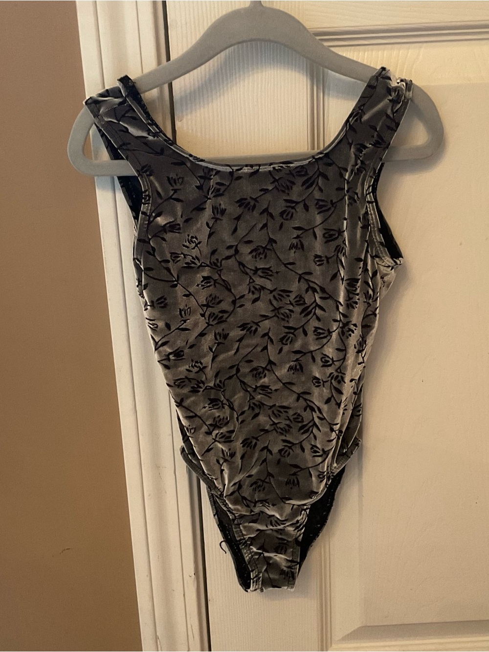 Danskin Intermediate gymnastics leotard in gray velvet with black floral pattern